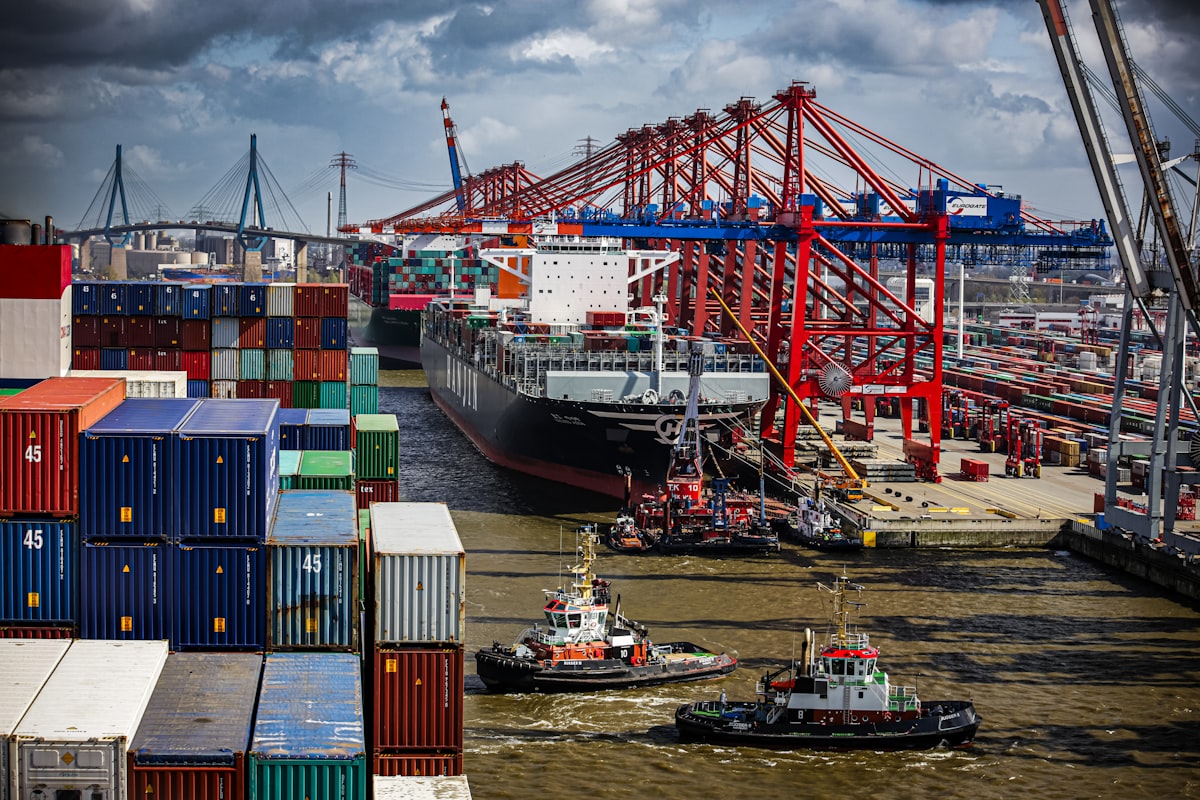 Tugboat assisting a cargo vessel — Atlas Marine husbandry support
